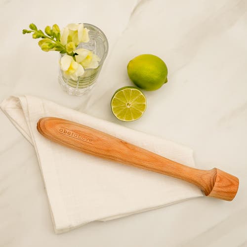 A Bar Above Wooden Cocktail Muddler In Natural