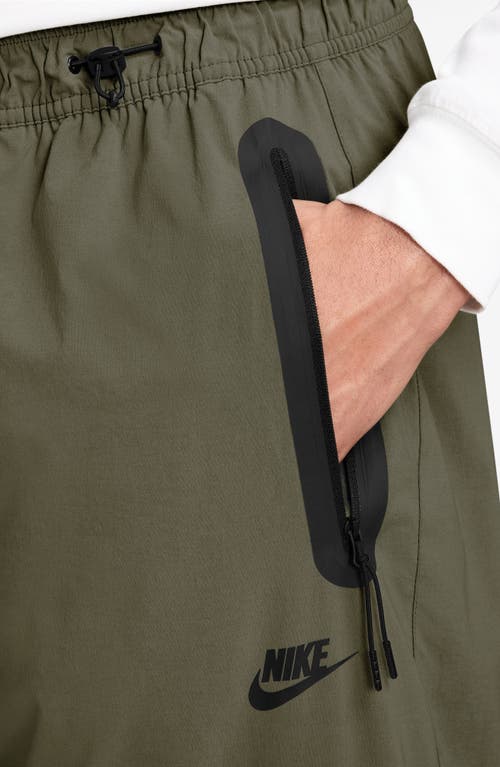 Nike Dri-fit Tech Wide Leg Woven Pants In Green