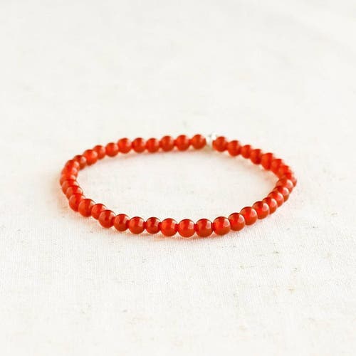 Tiny Rituals Carnelian Energy Bracelet In Red/orange