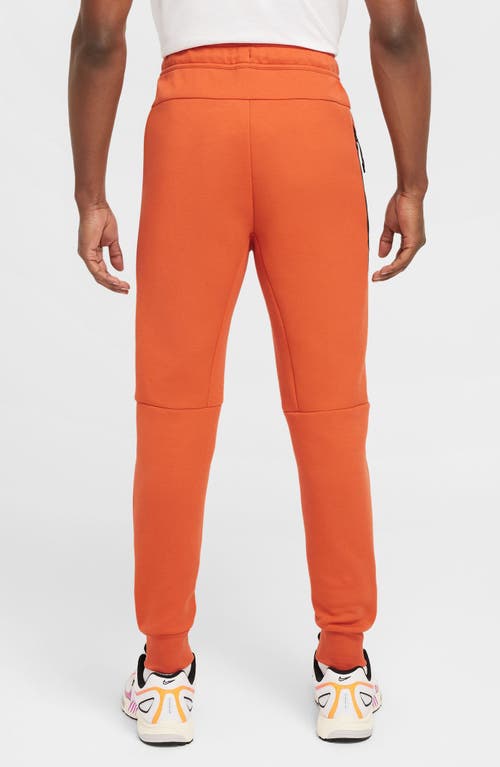 Nike Tech Fleece Joggers In Orange