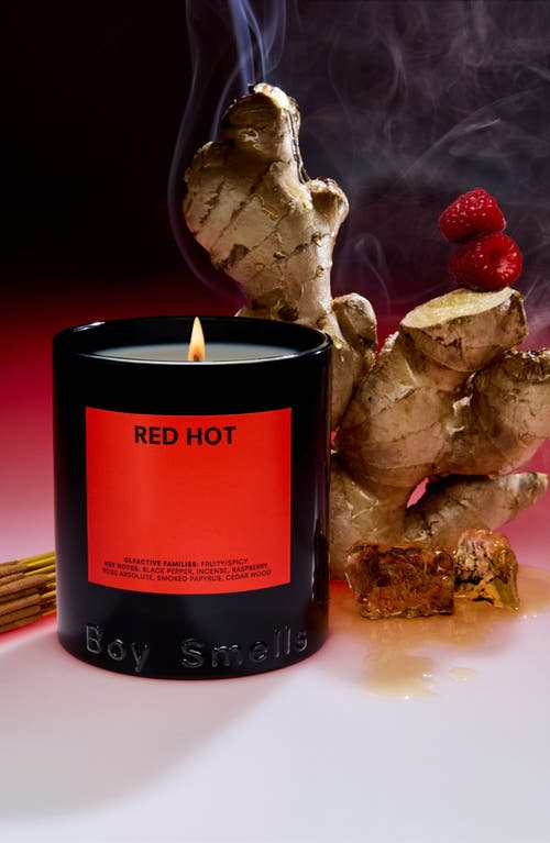 Boy Smells Red Hot Candle