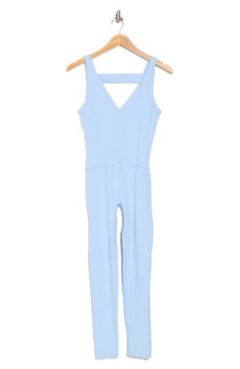 Shop Free People Fp Movement Never Better Strappy Back Jumpsuit In Oxford Blue