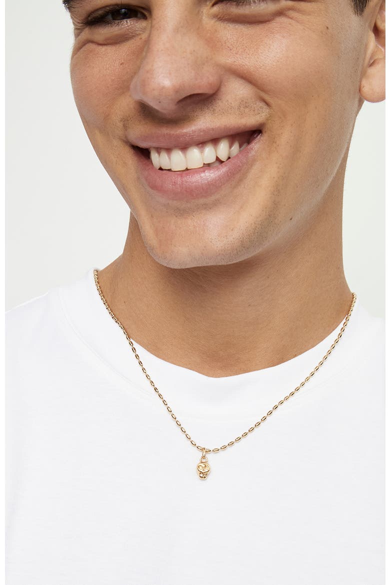 Gold Charm in the Shape of a Skull, Alternate, color, Gold