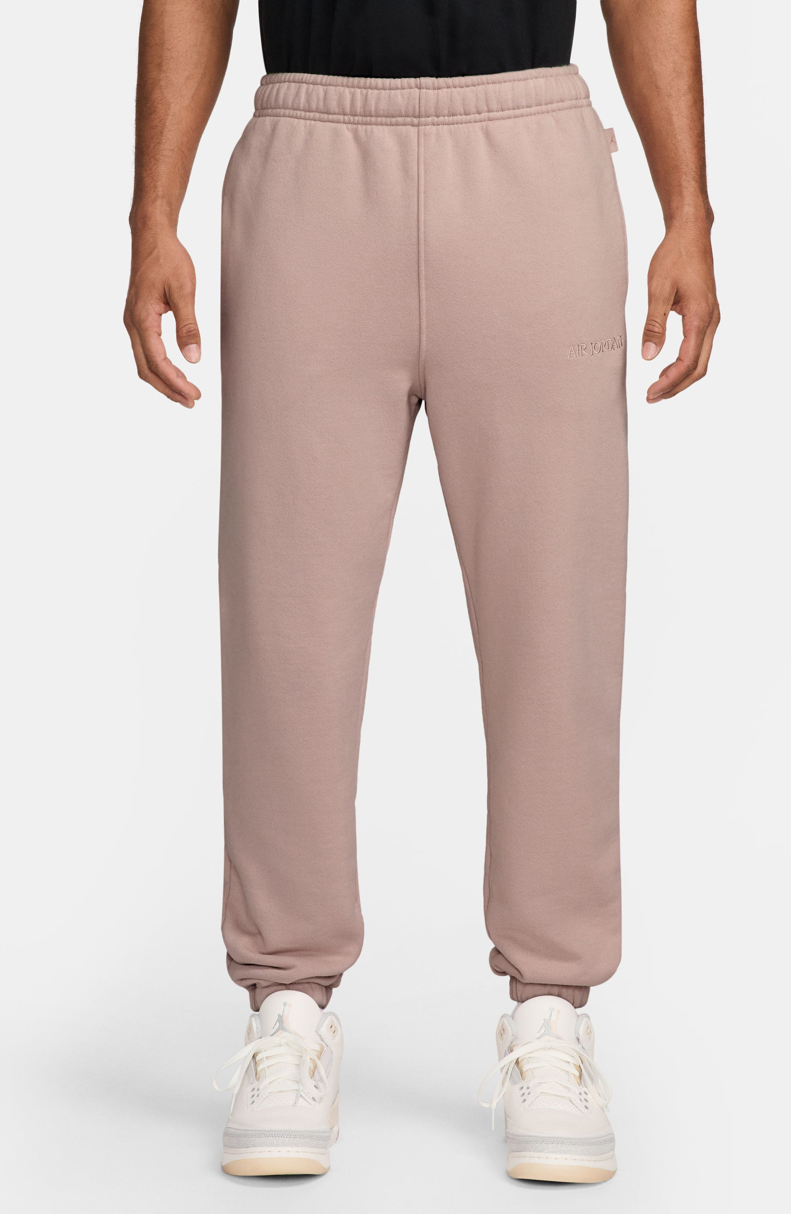 Jordan Wordmark Cotton Fleece Sweatpants in Pink Oxford 