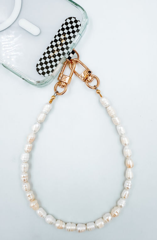 The Cæp Universal Wristlet In White