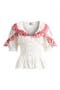 Caroline Cherry Embroidered Organic Cotton Peplum Top