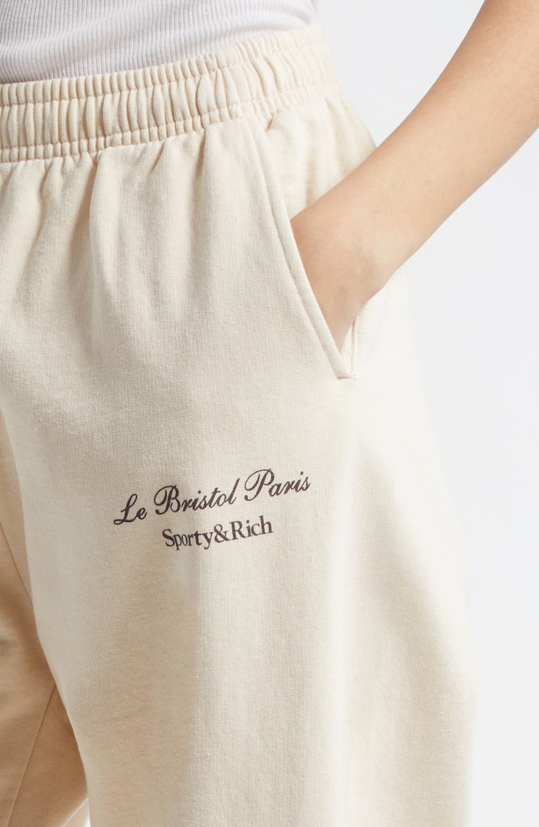 Sporty & Rich x Le Bristol Paris Faubourg Logo Cotton Joggers, Alternate, color, Cream