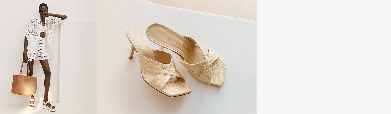 Woman wearing platform sandals. Heeled sandals with crisscrossed straps.