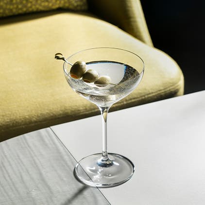 A martini on a bar.