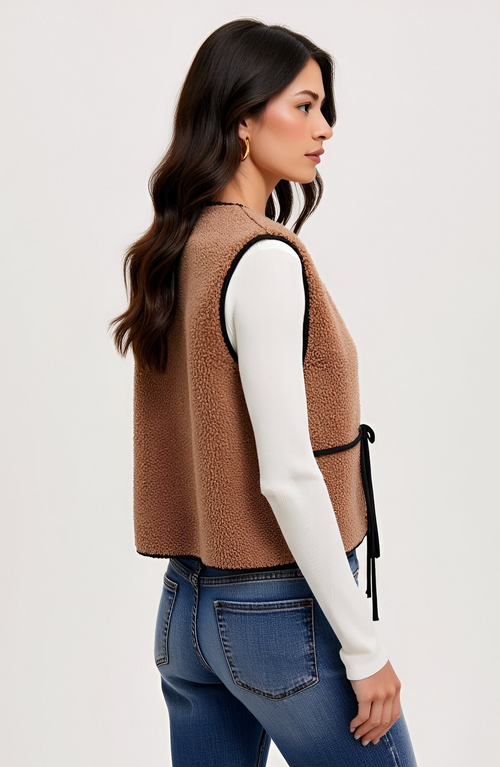 Modenaire Faux Shearling Contrast-trim Tie-front Vest In Brown