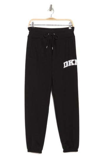 Dkny Rhinestone Arched Logo Joggers In Black/eggnog
