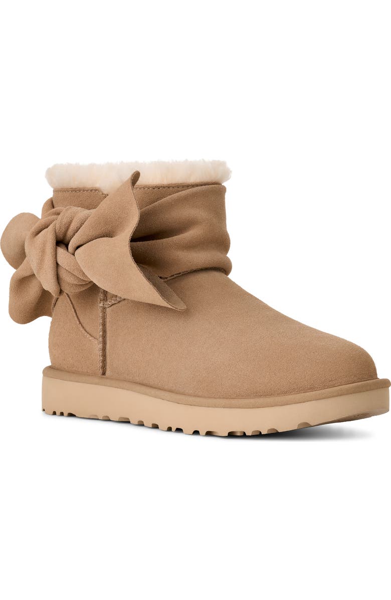 UGG<sup>®</sup> Classic Mini Bow Genuine Shearling Lined Boot, Main, color, Sand