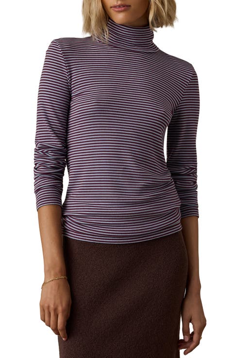 Featherweight Freestyle Turtleneck Top