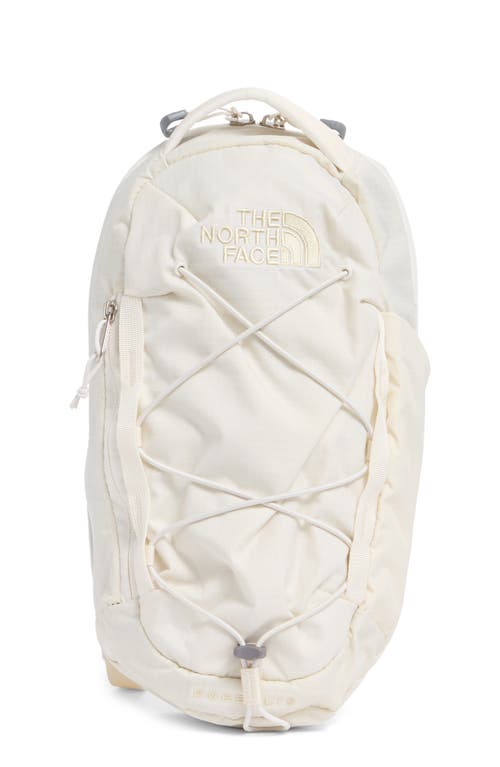 Shop The North Face Borealis Water Repellent Sling Backpack In White Dune/gravel