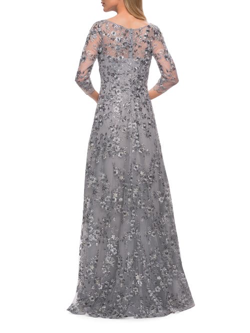 La Femme Lace Gown With Full Skirt And Sheer Lace Sleeves In Silver