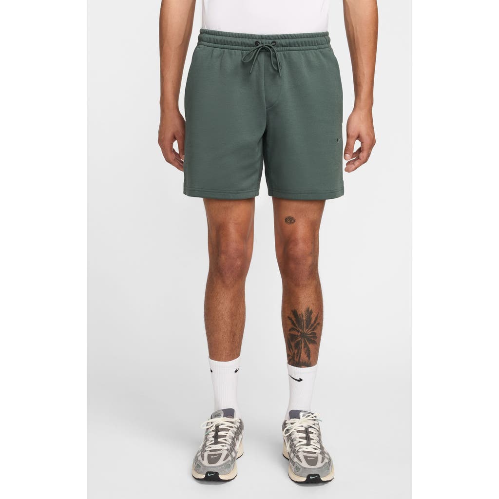 Nike Men's Primary Fleece 7" Dri-fit Uv Unlined Performance Shorts In Vintage Green/vintage Green