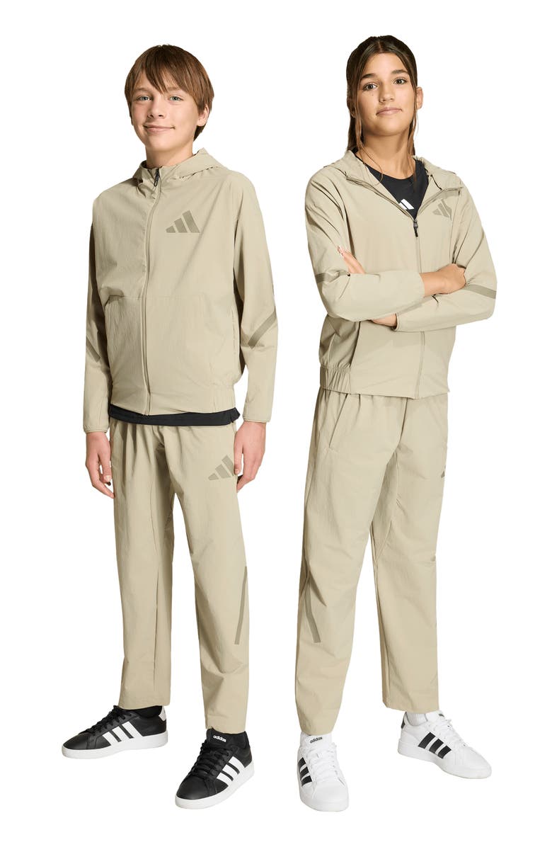 adidas Originals Kids' Z.N.E. Woven Travel Pants, Alternate, color, Wonder Cargo/ Clay