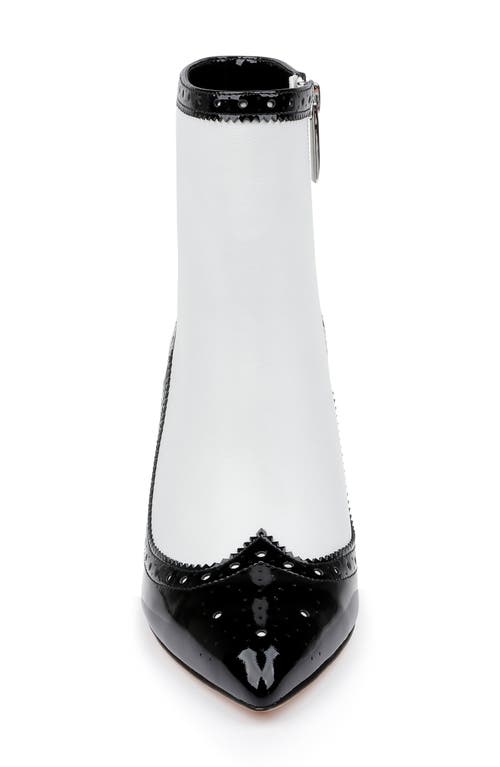 L'agence Ember Wingtip Pointed Toe Bootie In Black