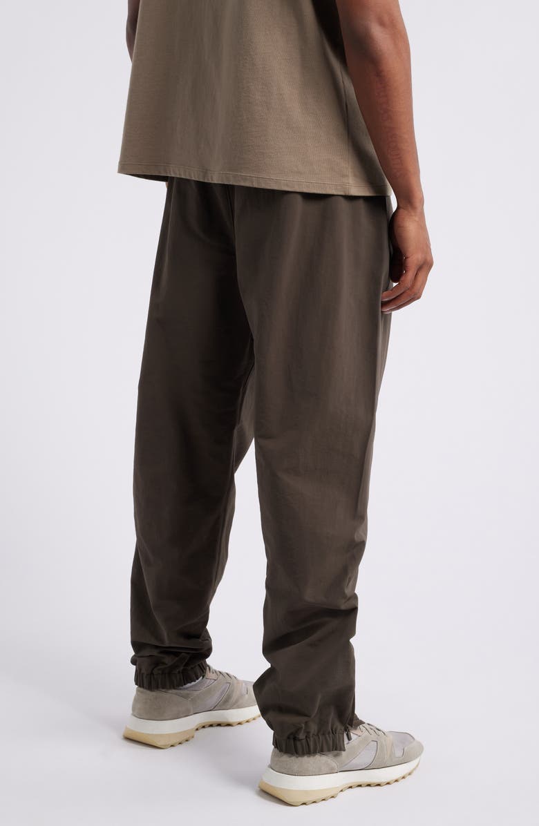 Fear of God Essentials Military Nylon Blend Track Pants, Alternate, color, 