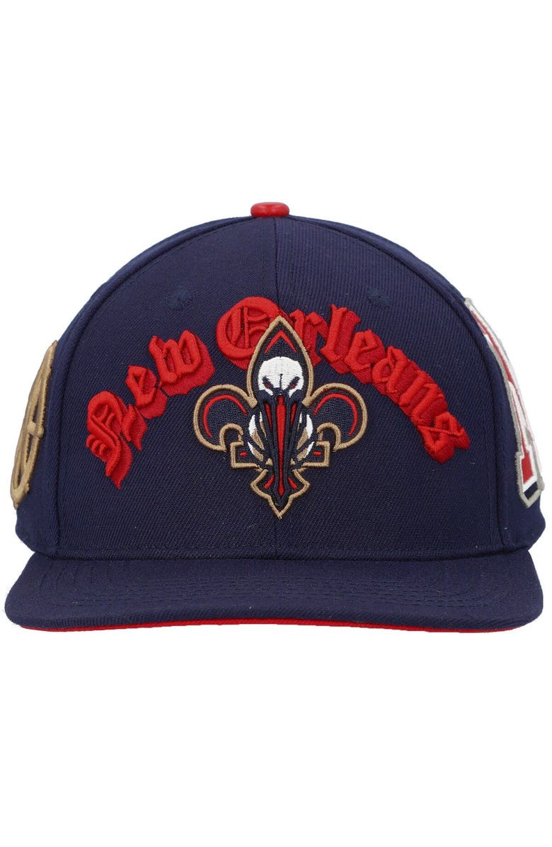 PRO STANDARD Men's Pro Standard Navy New Orleans Pelicans Old English Snapback Hat, Alternate, color, 