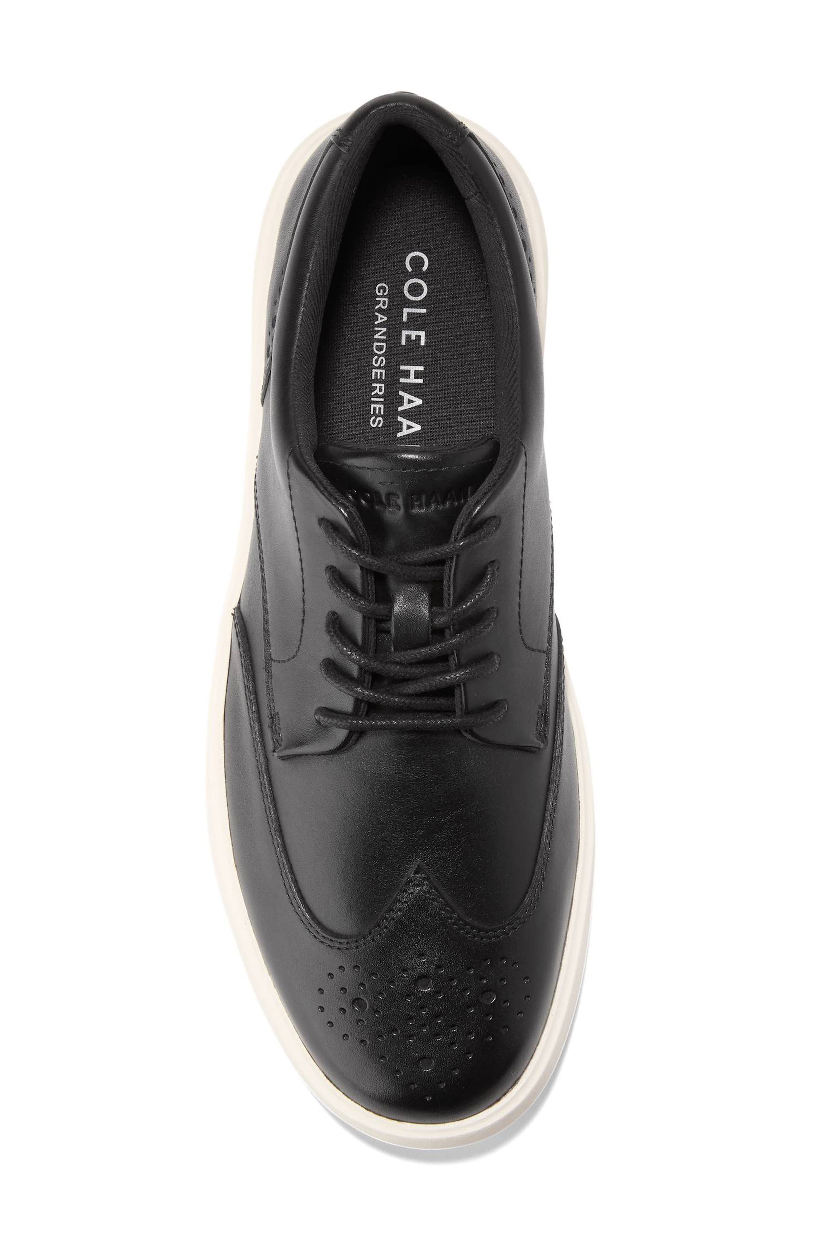 Cole Haan Grand Daily Wingtip Sneaker, Alternate, color, Black / Ivory