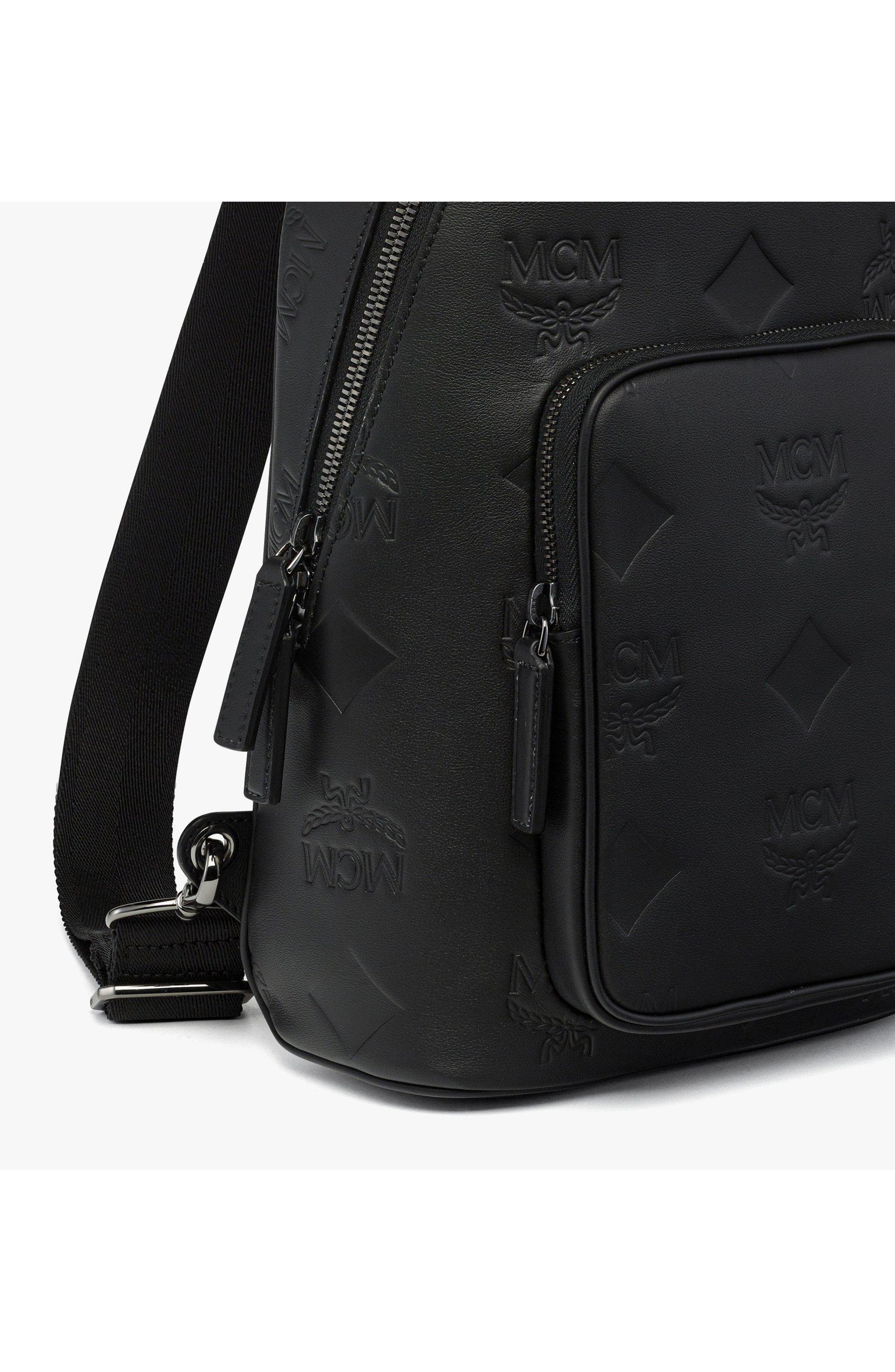 MCM Aren Sling Bag in Embossed Monogram Leather, Alternate, color, Black
