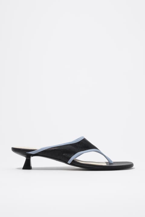 Heeled sandal in leather