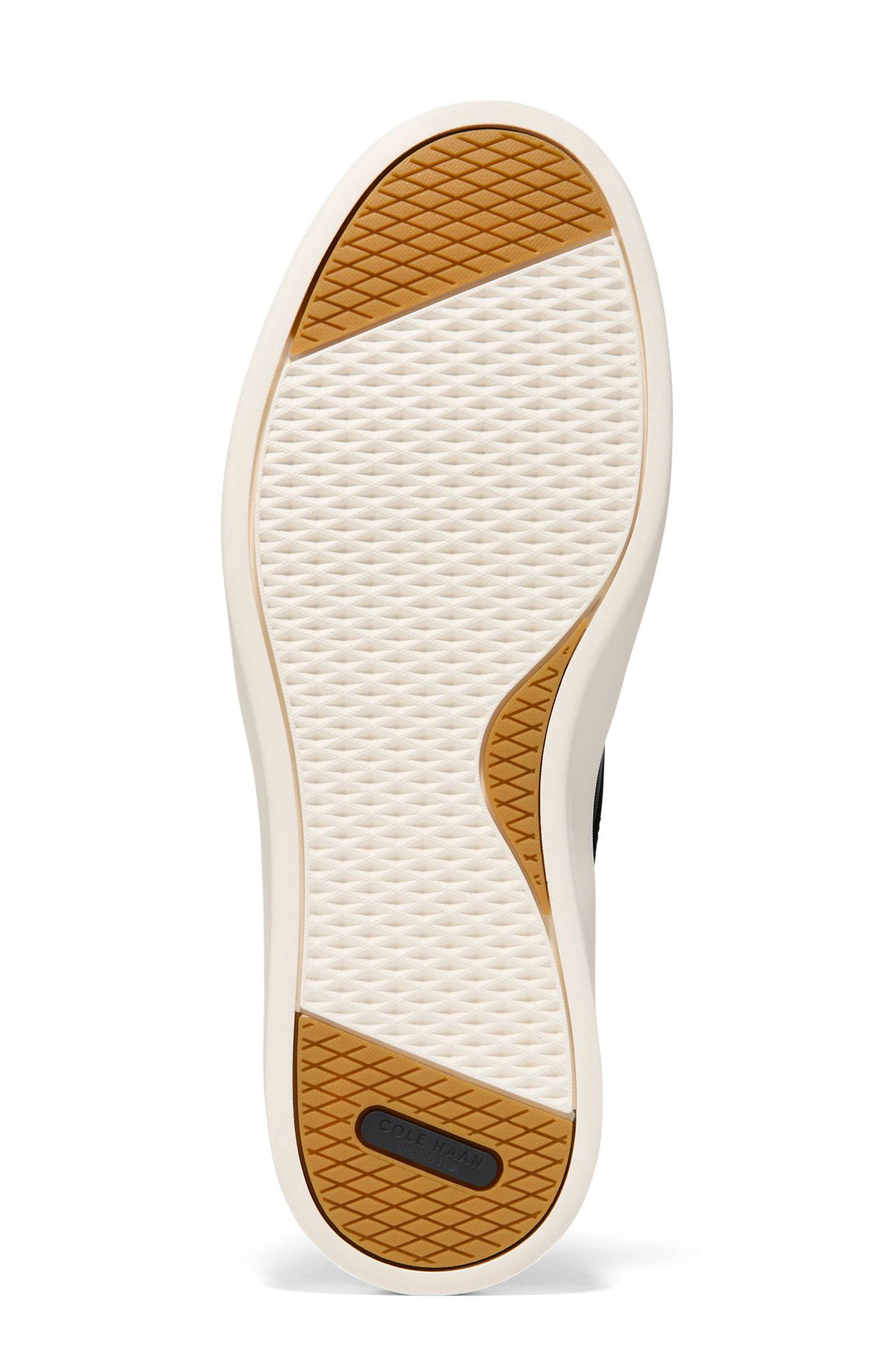 Cole Haan Grand Daily Wingtip Sneaker, Alternate, color, Black / Ivory