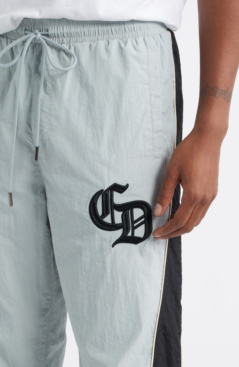 CRIMINAL DAMAGE Panelled Training Nylon Pants, Alternate, color, Blue/Black