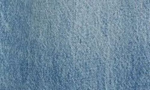 Alexander Wang Logo Hotfix Oversize Rounded Low Rise Jeans In Vintage Light Indigo