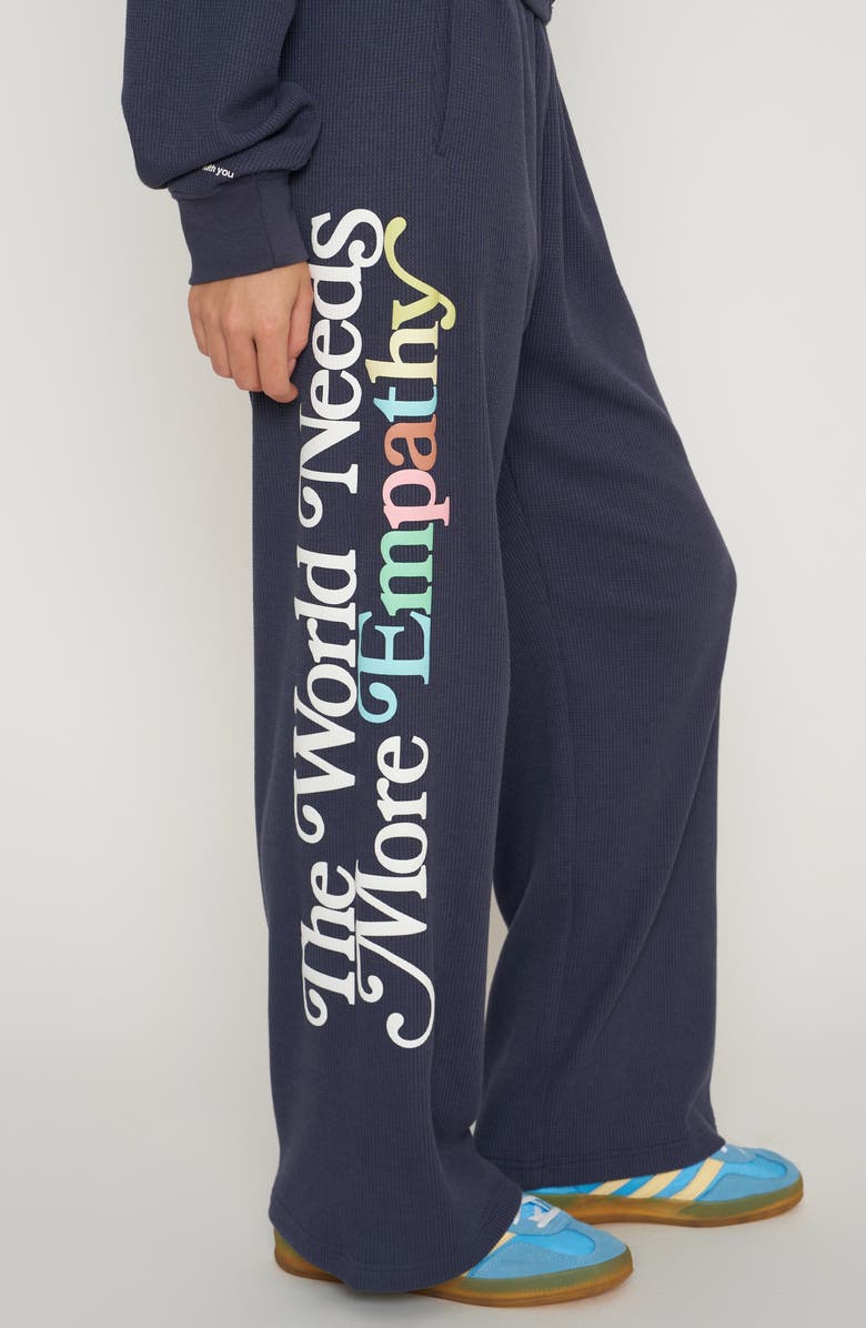 THE MAYFAIR GROUP World Needs Empathy Waffle Knit Fleece Graphic Sweatshirt, Alternate, color, Navy Blue