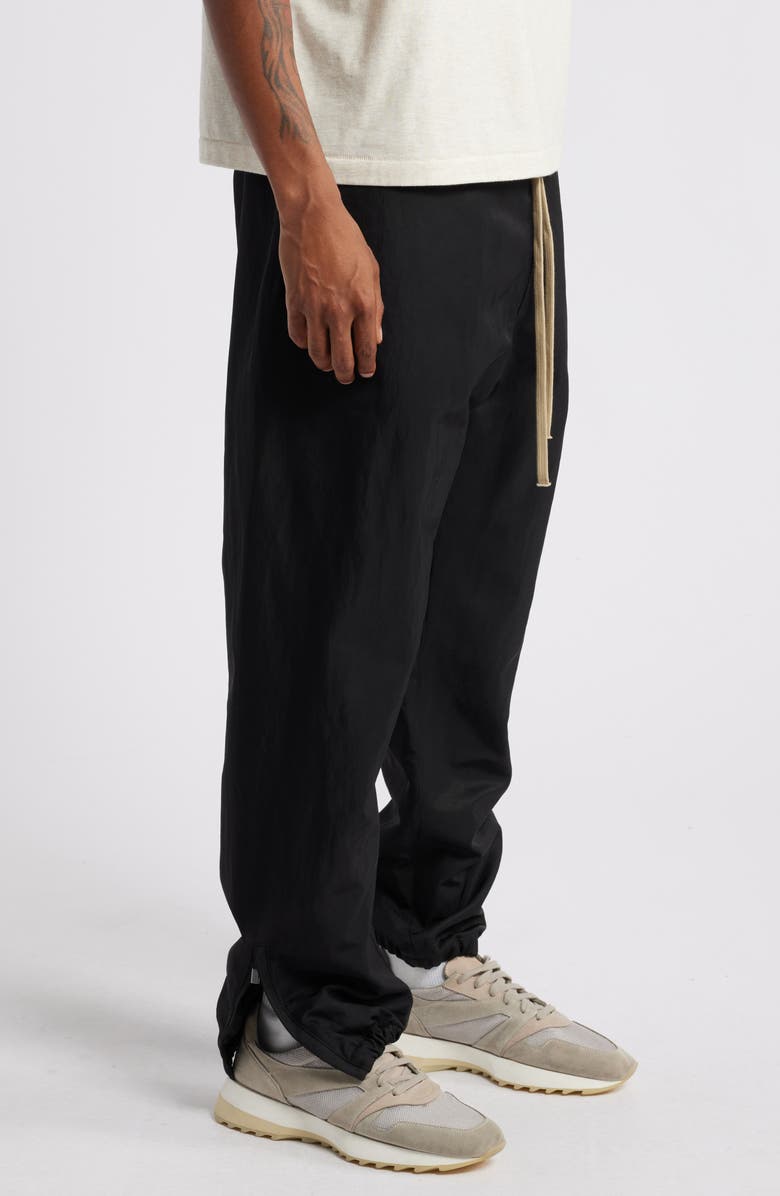 Fear of God Essentials Gender Inclusive Textured Nylon Track Pants, Alternate, color,