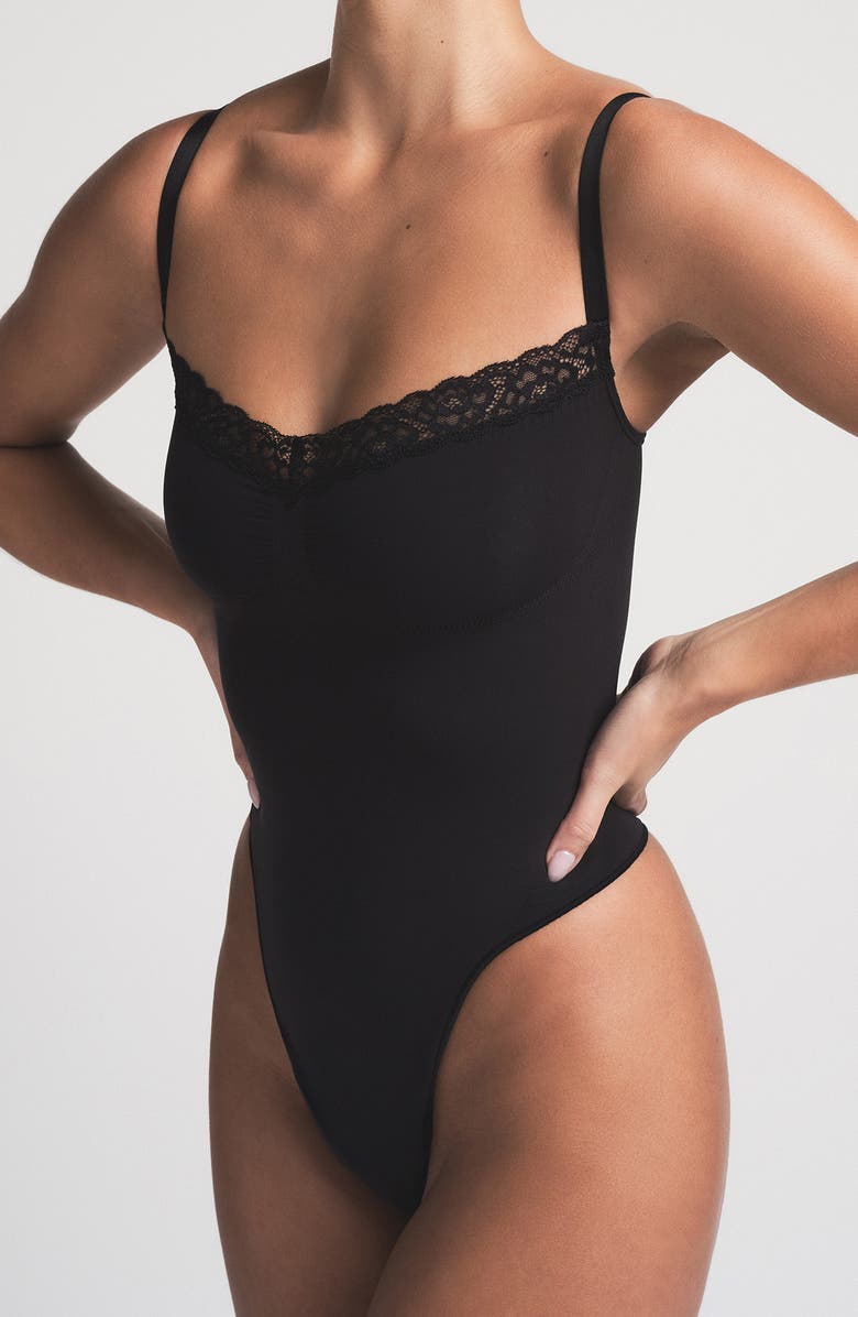 SKIMS Lace Thong Bodysuit, Alternate, color, 