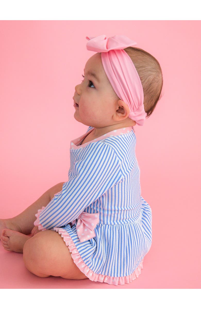 RuffleButts UPF50+ Seersucker Long Sleeve One Piece Bow Peplum Rash Guard Swimsuit, Alternate, color, Periwinkle Blue Seersucker