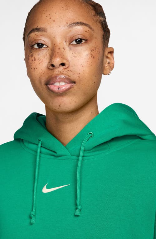 Shop Nike Sportswear Phoenix Fleece Pullover Hoodie In Stadium Green/sail