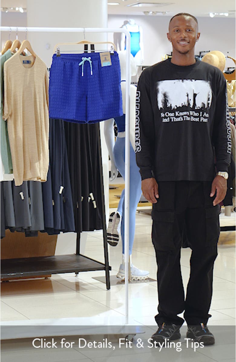 The Citrus Punches Grid Textured 5.5-Inch Swim Trunks, sales video thumbnail