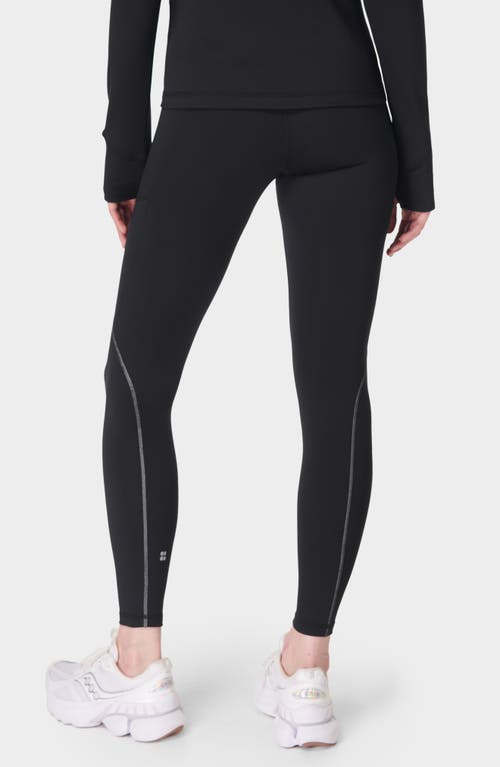 Shop Sweaty Betty Therma Boost Pocketed 7/8 Running Leggings In Black