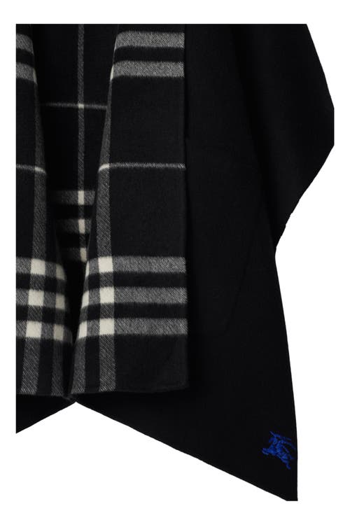 Shop Burberry Reversible Check Cashmere Cape In Black/calico