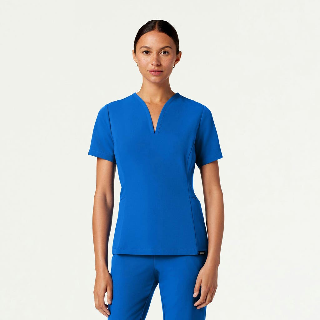 Jaanuu 2-pocket Tailored V-neck Scrub Top In Blue