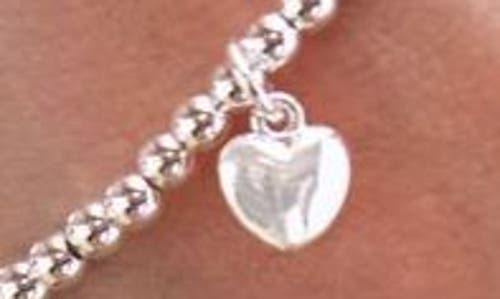 Estella Bartlett Puffed Heart Sienna Beaded Stretch Bracelet In White