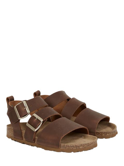 An elegant triple strap sandal