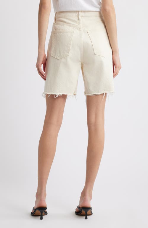 Shop Frame The Timeless Cutoff Denim Shorts In Milkshake