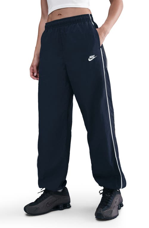 Nike Sportswear Windrunner Water Repellent Track Pants In Blue
