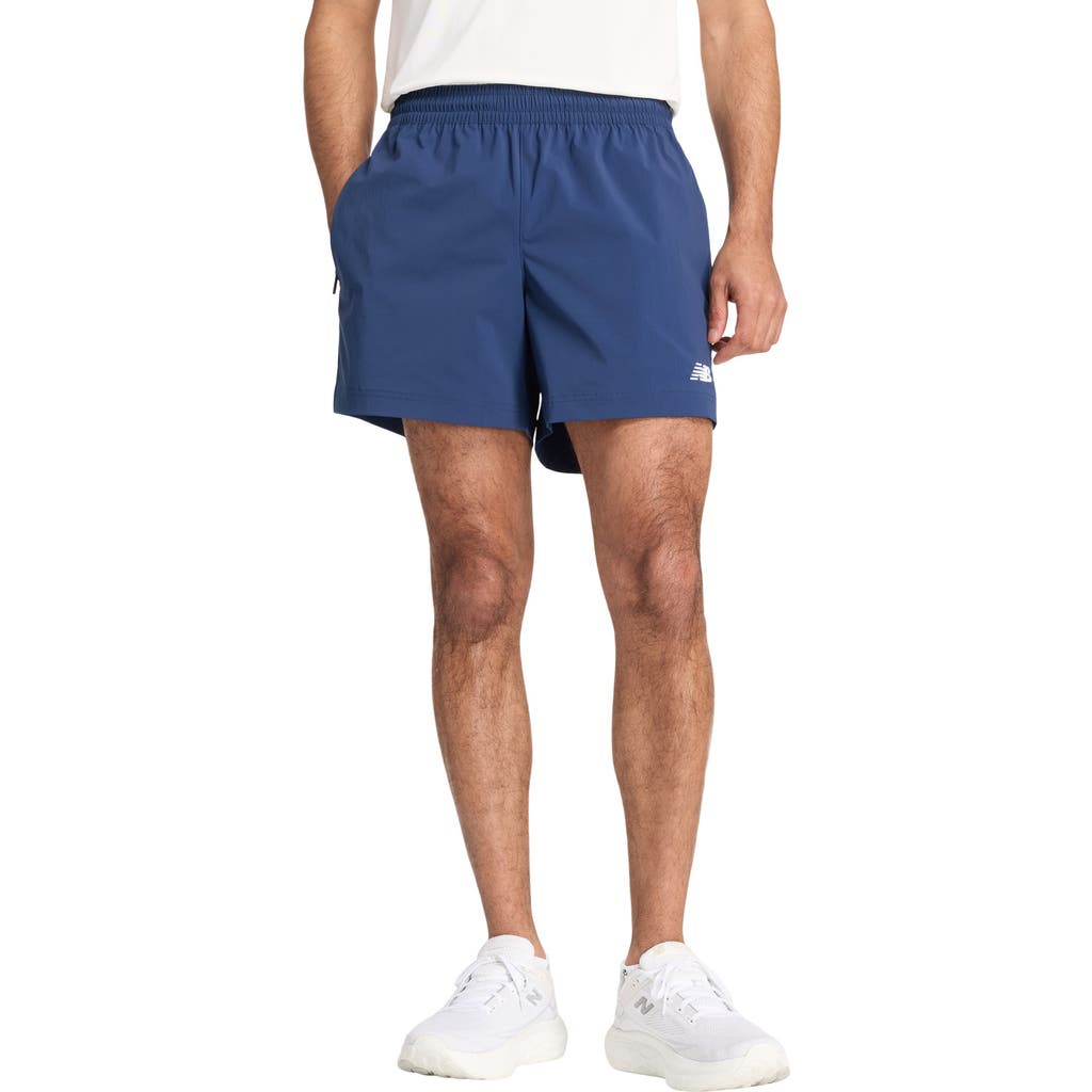 New Balance Athletics Woven Stretch Nylon Shorts In Blue