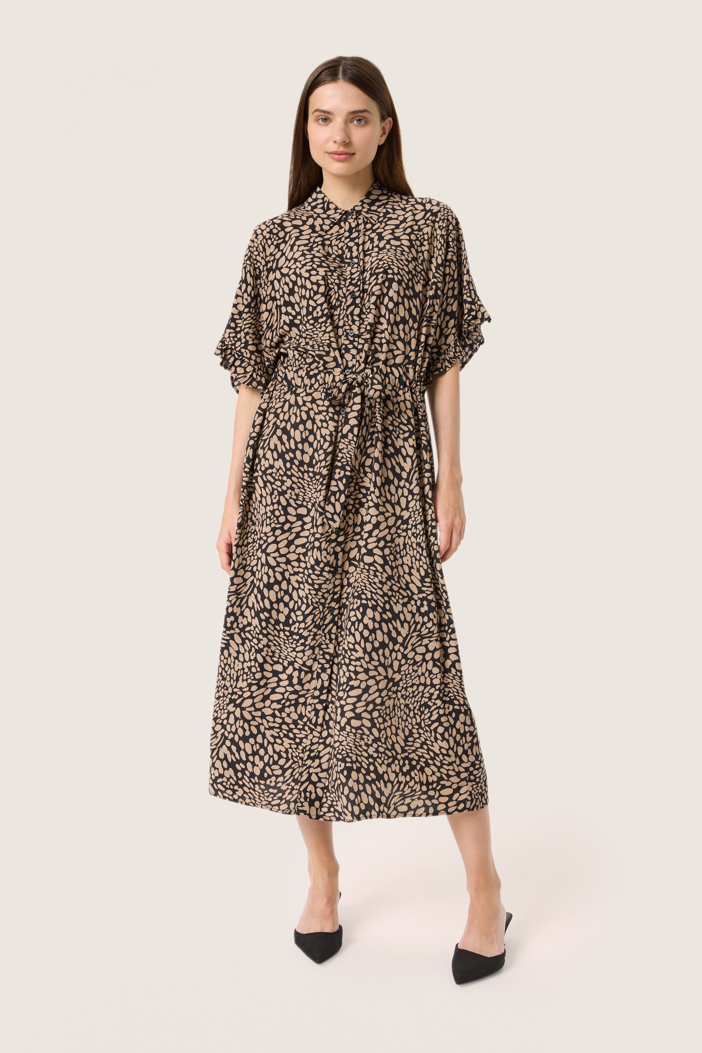 selected Black With Brown Dots