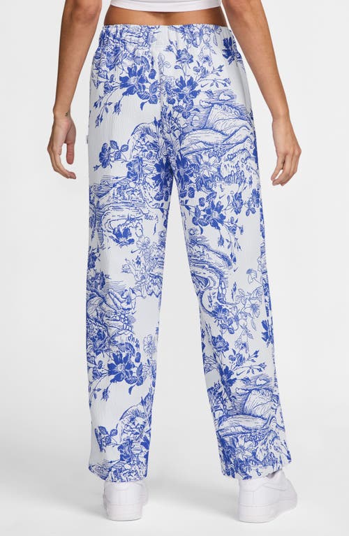 Shop Nike Sportswear Collection Jacquard Track Pants In White/hyper Royal/black