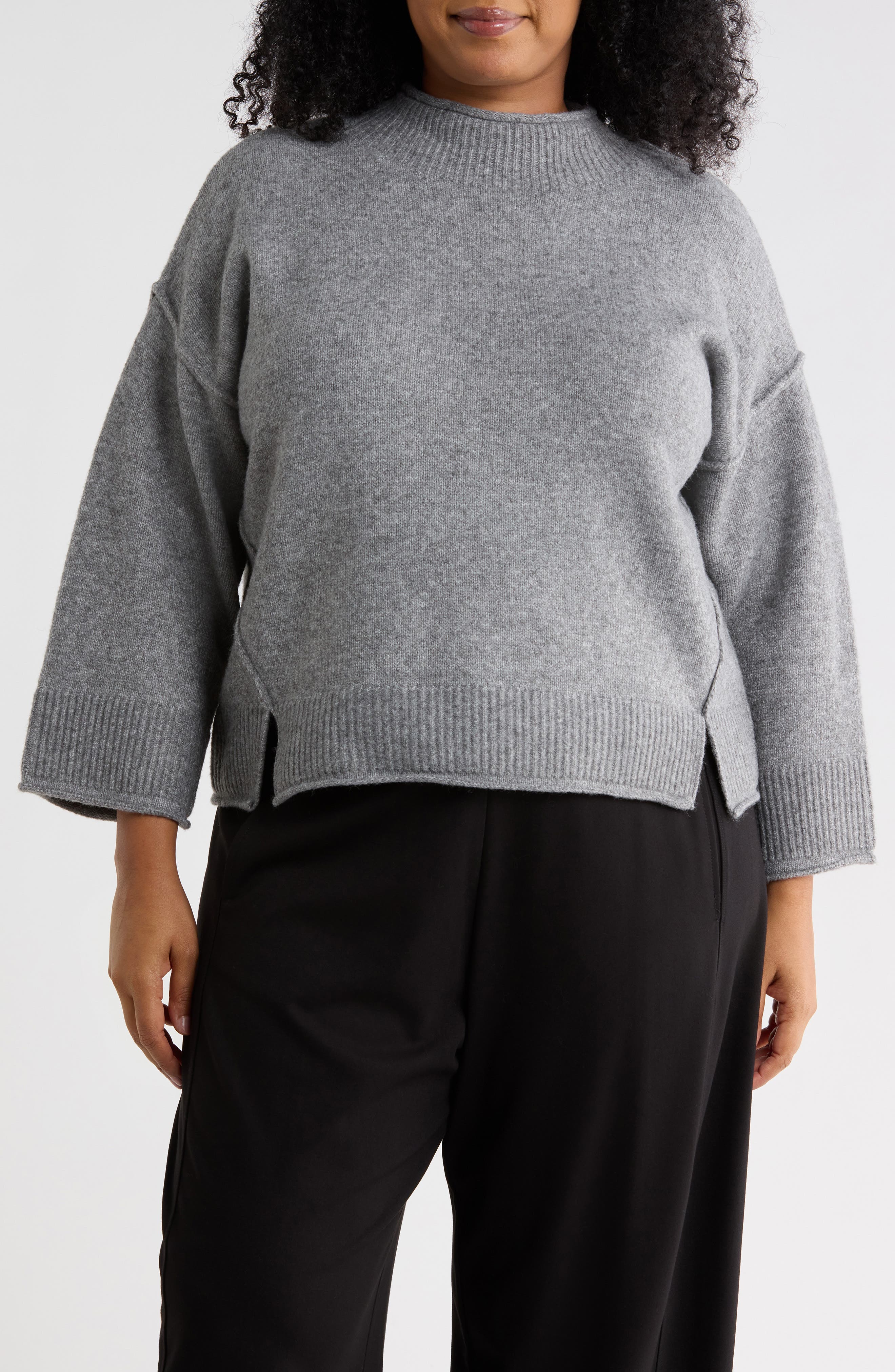 Exposed Seam Mock Neck Sweater