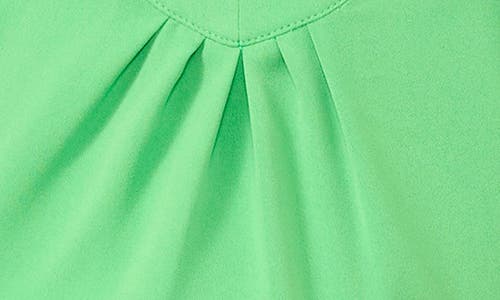Cece Flutter Sleeve Crepe Top In Medium Green