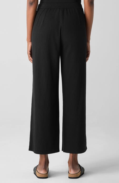 Shop Eileen Fisher Jersey Ankle Wide Leg Pants In Black