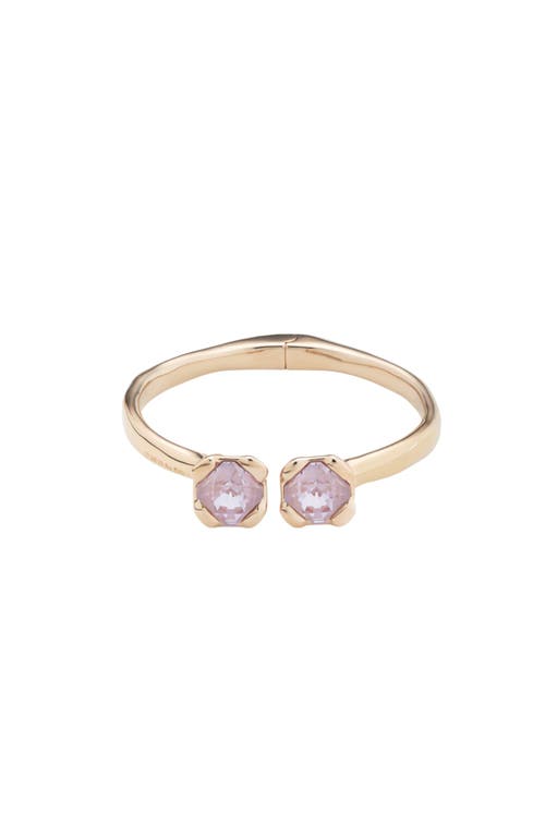 UNODE50 18k gold plated metal alloy rigid bracelet, with inner spring and two pink faceted crystals.  product